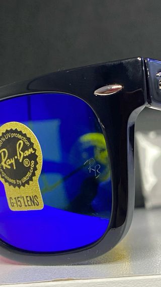 Gafas de sol Ray-Ban negras y azules