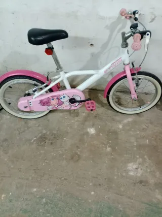 Bicicleta infantil blanca y rosa