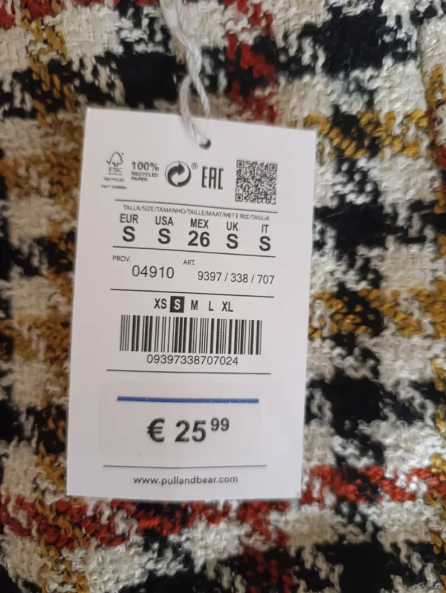 Falda cuadros flecos