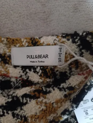 Falda cuadros flecos