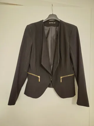 Giacca elegante senza collo con zip dorate