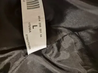 Giacca elegante senza collo con zip dorate