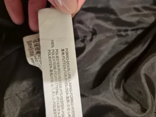 Giacca elegante senza collo con zip dorate