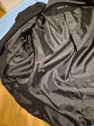 Giacca elegante senza collo con zip dorate