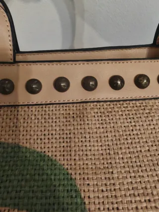 Borsa capiente juta con foglie verdi