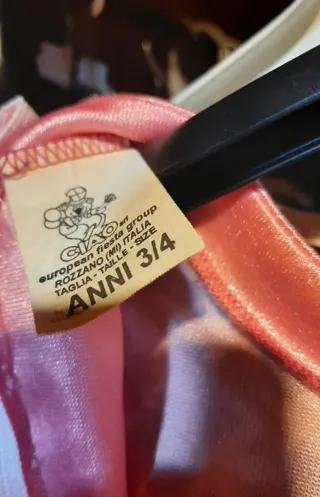 Vestito carnevale rosa con stelle oro