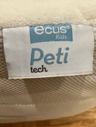 Minicuna blanca con ruedas