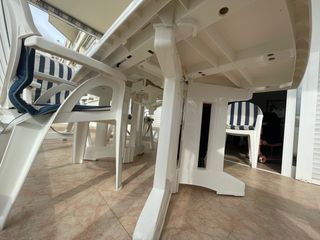 Conjunto mesa y 6 sillas exterior resina.