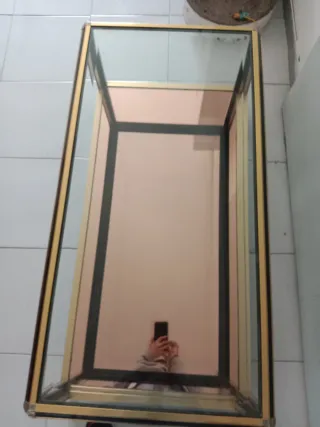 Mesa de centro cristal y metal dorado