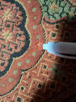 Manton antiguo , tonos anaranjados, tejas.