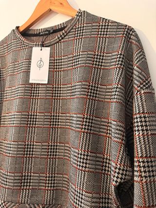 Blusa Stradivarius cuadros gris y naranja