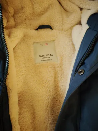 Dos abrigos talla alrededor de 9 -10 años