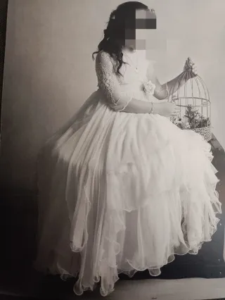 Precioso vestido de comunión rosa empolvado.