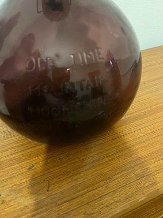 Bottiglione viola con guarnizione