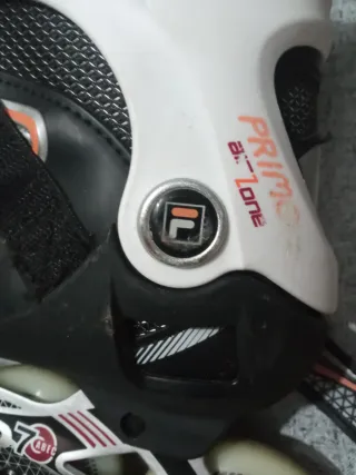 Patines en línea Fila negros y naranjas