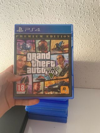 PS4 (Playstation 4) con 2 mandos y 11 juegos