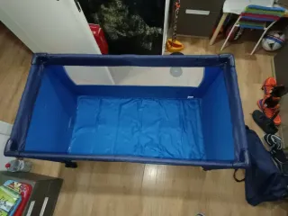 Cuna de viaje azul