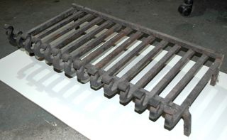parrilla de chimenea de hierro forjado.