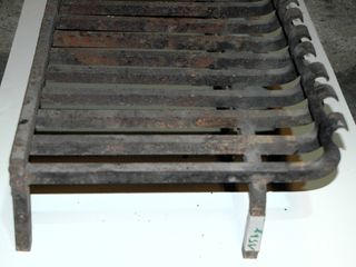 parrilla de chimenea de hierro forjado.