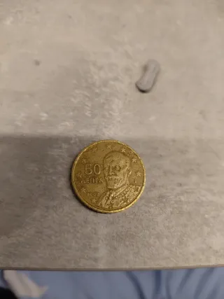 Moneda 50 cent Greciacon la letra F en la estrella