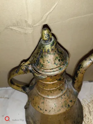 Brocca vintage in metallo