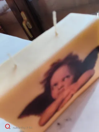 Candela decorativa con immagine di angelo