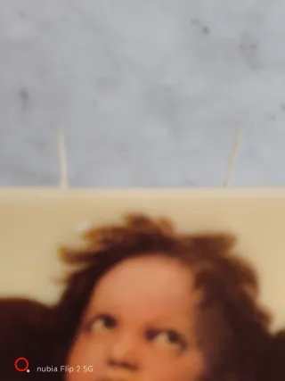 Candela decorativa con immagine di angelo