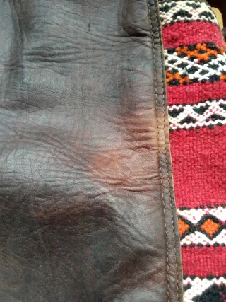 Bolso de mano cuero y telas étnicas