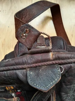 Bolso de mano cuero y telas étnicas