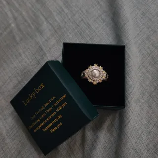 Anillo de plata con perla y circonitas