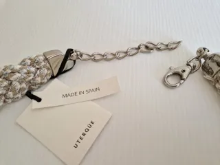 Cinturón Uterqüe trenzado beige y plata