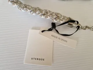 Cinturón Uterqüe trenzado beige y plata