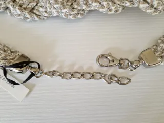 Cinturón Uterqüe trenzado beige y plata