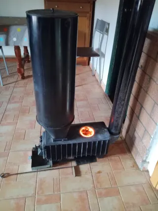 Estufa leña hueso aceituna pellet cáscara de almen