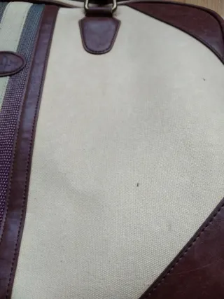 Maleta de viaje Oysho beige y marrón