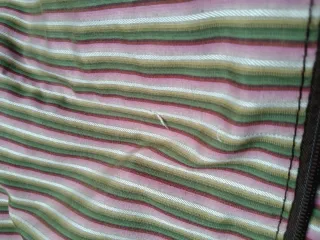 Maleta de viaje Oysho beige y marrón