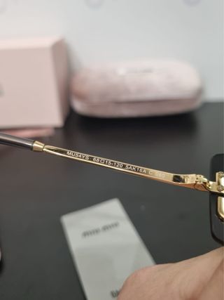 Occhiali Miu Miu Donna Neri ottime condizioni