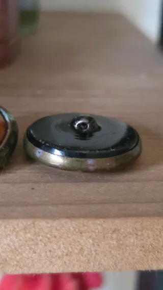 Par de botones antiguos de baquelita