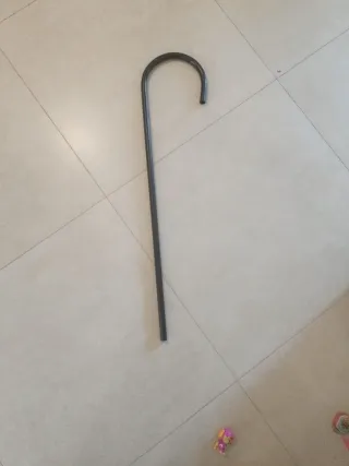 Bastón de juguete metálico sin usar