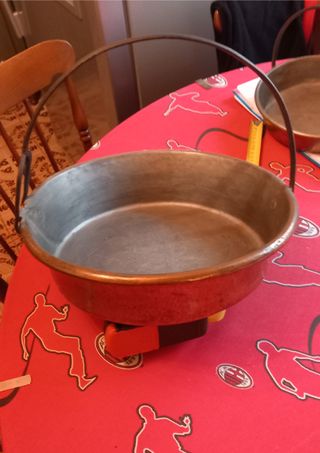 Pentola in rame con manico