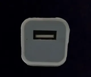 Adaptador de corriente