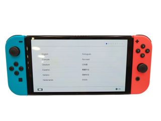 CONSOLA NINTENDO SWITCH OLED 64GB + JOYCONS + GRIP + BASE + CARGADOR + CAJA