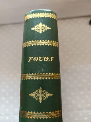 Tres álbumes de fotos.