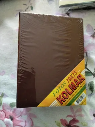 Tres álbumes de fotos.