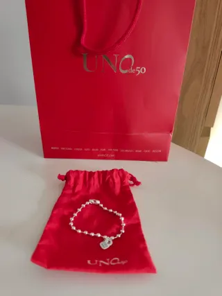 Pulsera Uno de 50 plateada con bolitas