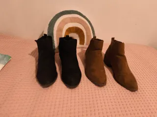 Botines planos negros y marrones