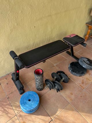 Banco de pesas y discos