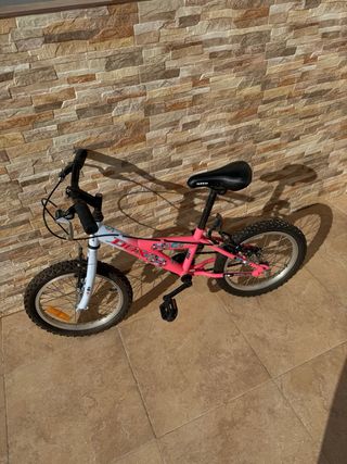 Bicicleta infantil rosa y blanca