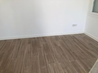 Suelo porcelánico imitación madera