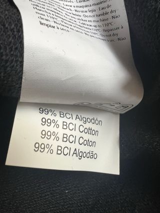 Top asimétrico manga larga negro Scalpers.Talla XS